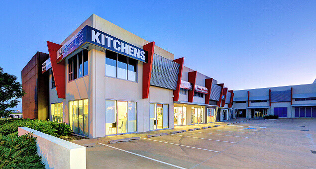 Large commercial buildings at dusk